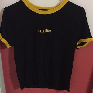 Black and yellow cropped “feelings” shirt